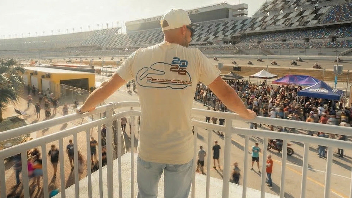 MotoAmerica tee overlooking the track and grandstand